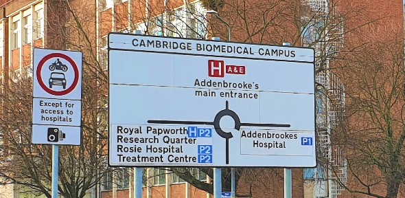 Photo of information sign at Hills Road entrance to the Cambridge Biomedical Campus