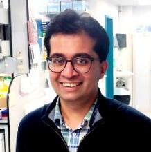 Portrait photo of Dr Siddhartha Kar in his laboratory